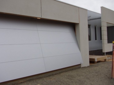 Теплые подъемно поворотные ворота для гаража